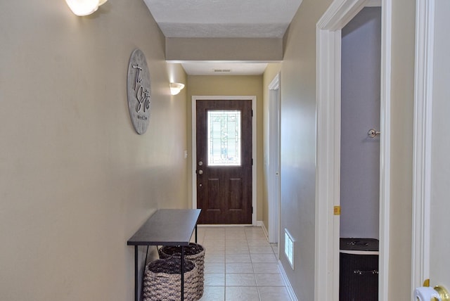 8122 Covington Ct, Newburgh, IN 47630 - doorway featuring light tile patterned floors and baseboards