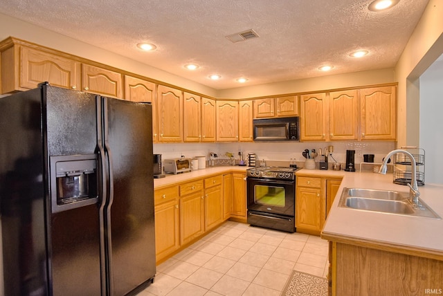 8122 Covington Ct, Newburgh, IN 47630 - kitchen with black appliances, a sink, a textured ceiling, light tile patterned flooring, and light countertops