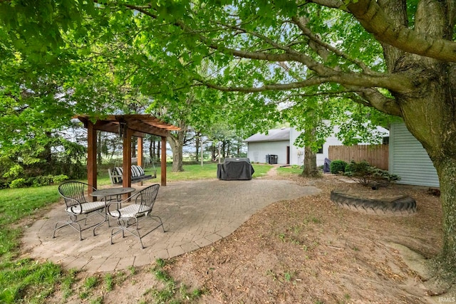view of patio featuring a pergola