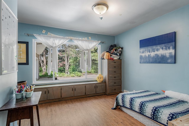 bedroom with light wood-style flooring