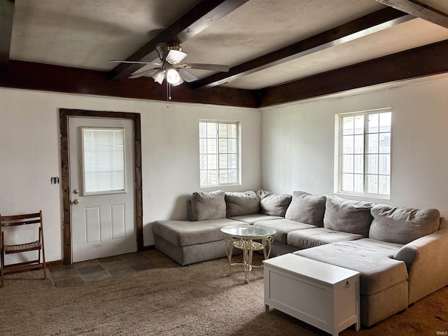 909 N Sullivan St, Alexandria, IN 46001 - living room with healthy amount of natural light, beam ceiling, and ceiling fan