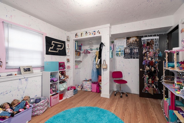 20 Gregory Ct, Lafayette, IN 47905 - bedroom featuring wood finished floors and a textured ceiling