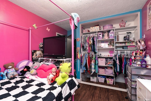 20 Gregory Ct, Lafayette, IN 47905 - bedroom featuring a textured ceiling, wood finished floors, and a closet