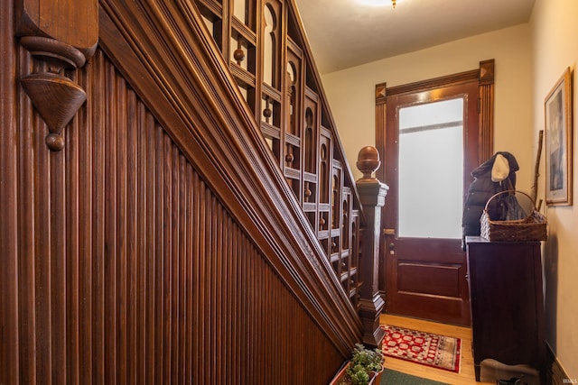 708 W 7th St, Bloomington, IN 47404 - hall with wood finished floors and stairs