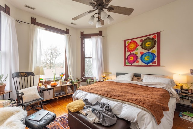 708 W 7th St, Bloomington, IN 47404 - bedroom with wood-type flooring and ceiling fan