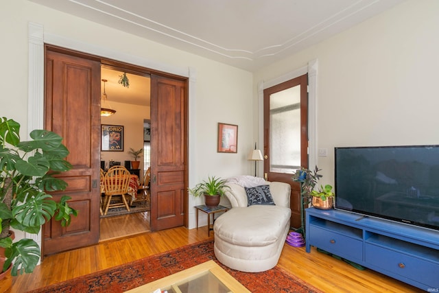 708 W 7th St, Bloomington, IN 47404 - living area featuring light wood finished floors