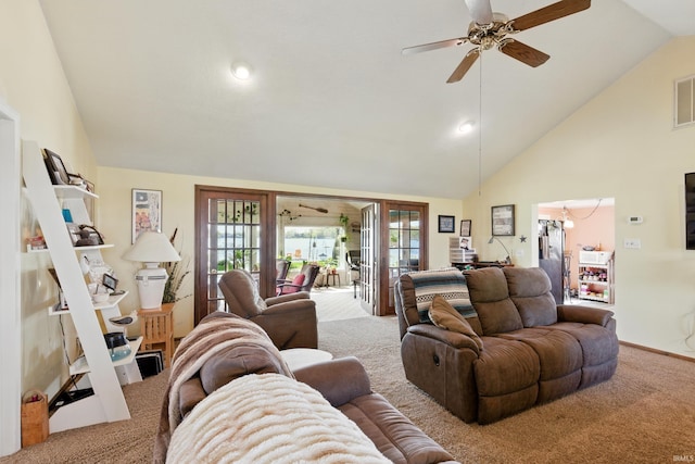 living area featuring carpet, a ceiling fan, and high vaulted ceiling