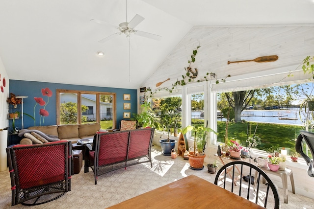 sunroom featuring lofted ceiling