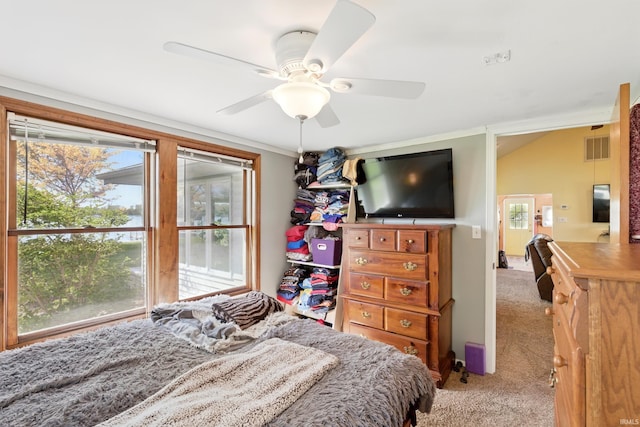 bedroom with light carpet and ceiling fan