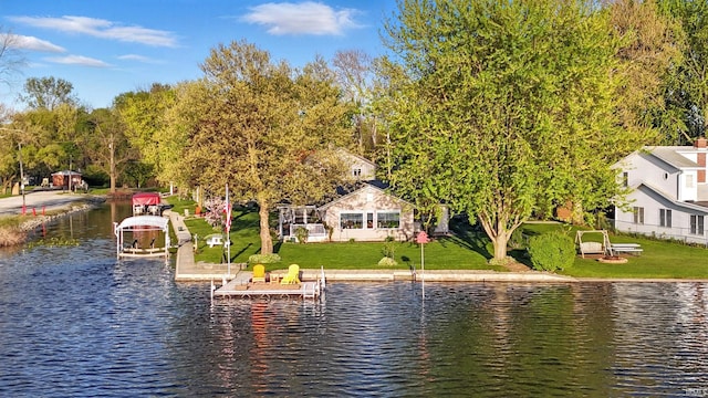 water view featuring a dock
