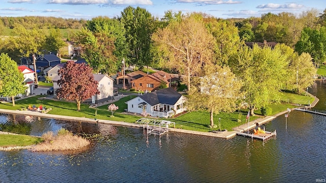 view of subject property with a nearby body of water