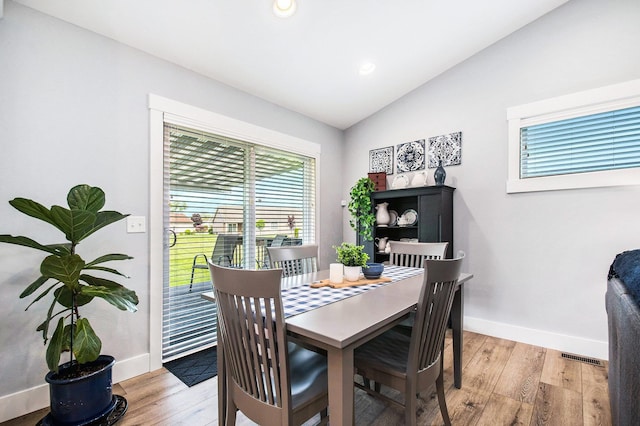 2007 Wakefield Rd, Goshen, IN 46528 - dining area with vaulted ceiling, light wood-style floors, baseboards, and recessed lighting