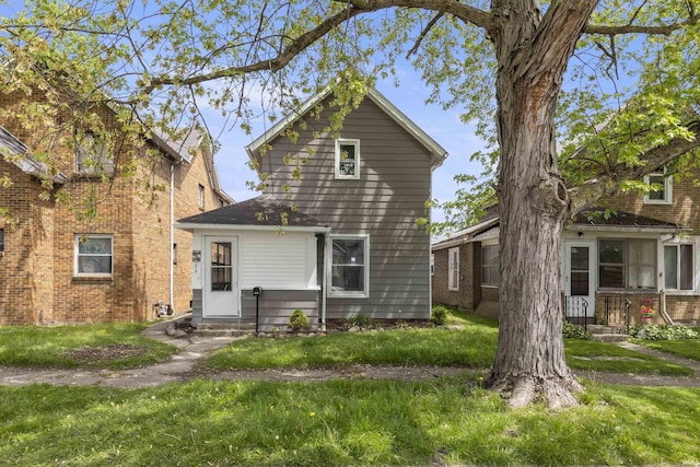 419 N Franklin St, Garrett, IN 46738 - back of property featuring a yard and entry steps