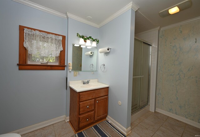 bathroom with tile patterned flooring, a shower stall, ornamental molding, and baseboards