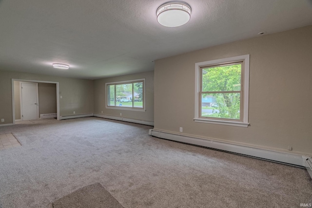 546 W Harrison, Wabash, IN 46992 - carpeted empty room with baseboards and baseboard heating