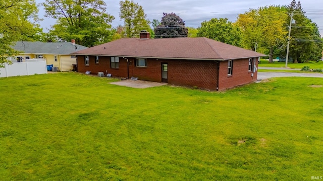 546 W Harrison, Wabash, IN 46992 - back of property with brick siding and a patio