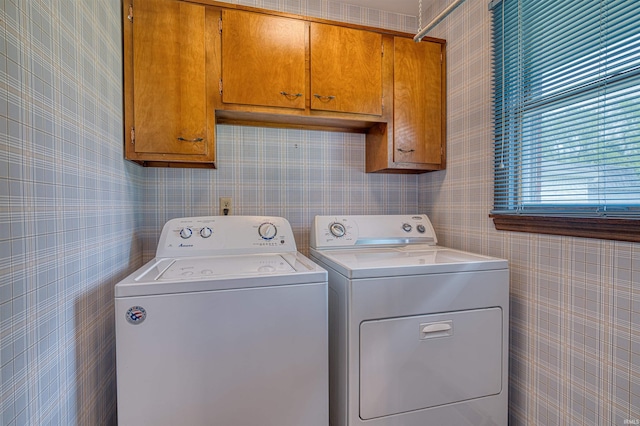 844 Old Plank Rd, Chandler, IN 47610 - washroom with cabinet space, wallpapered walls, and independent washer and dryer