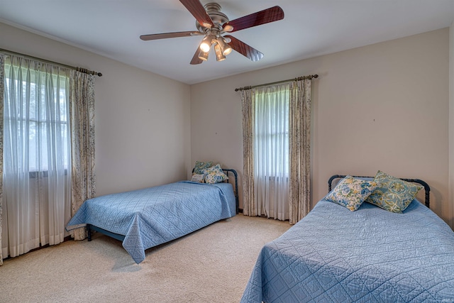 844 Old Plank Rd, Chandler, IN 47610 - carpeted bedroom with a ceiling fan
