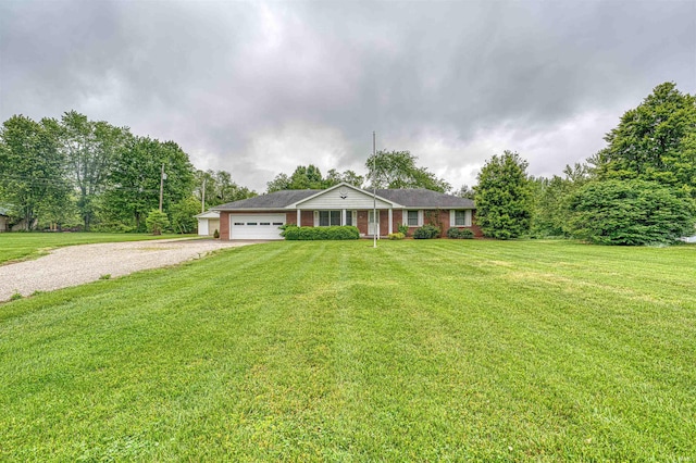 844 Old Plank Rd, Chandler, IN 47610 - single story home with driveway, a garage, and a front lawn