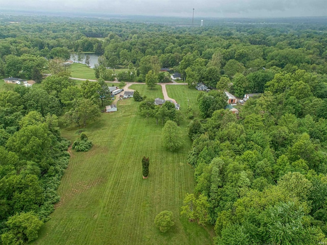 844 Old Plank Rd, Chandler, IN 47610 - aerial overview of property's location featuring a heavily wooded area and a nearby body of water