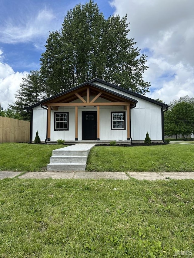 403 S Meridian St, Jasonville, IN 47438 - view of front of house featuring board and batten siding