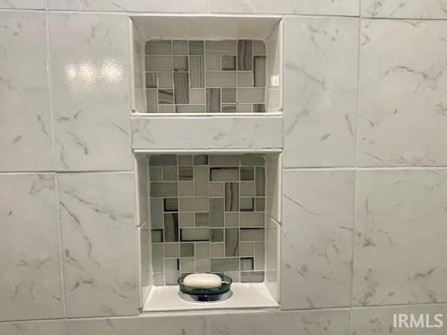 bathroom view of a tile shower