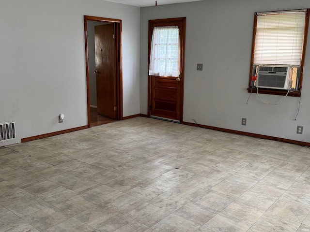 109 S 3rd St, Edwardsport, IN 47528 - entrance foyer featuring baseboards and cooling unit
