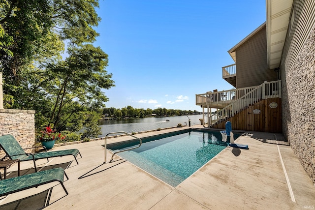10140 Jefferson Rd, Osceola, IN 46561 - view of swimming pool with stairs, a patio, and a deck with water view