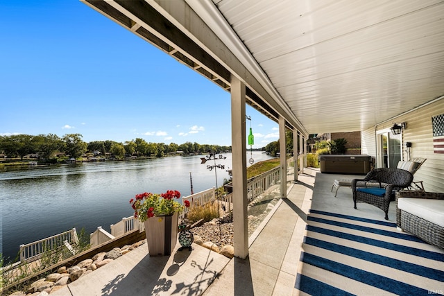 10140 Jefferson Rd, Osceola, IN 46561 - view of patio / terrace with a hot tub and a water view