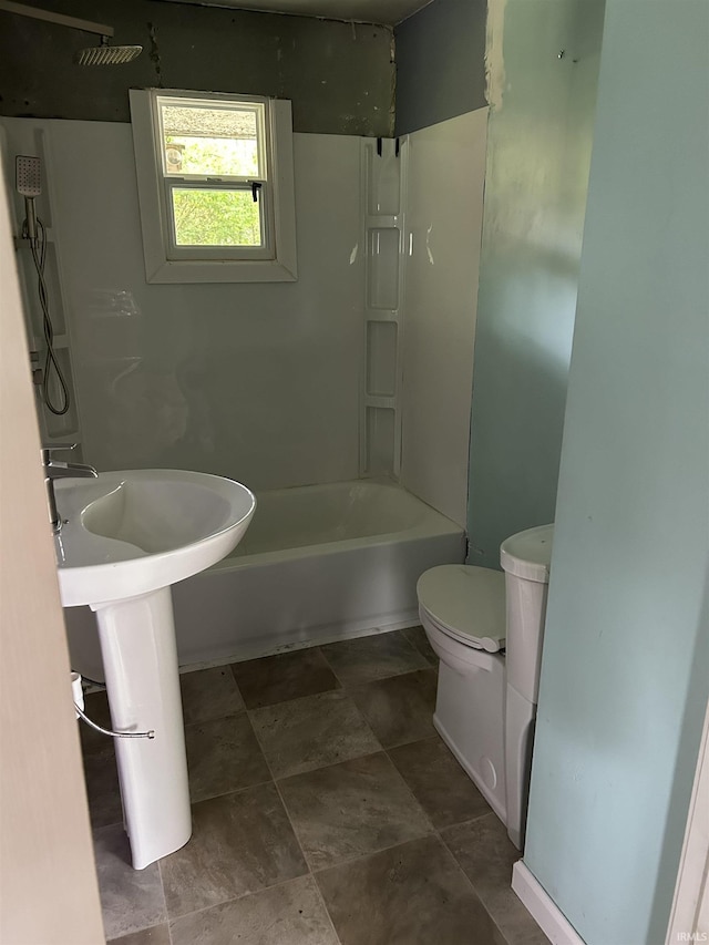 8965 W County Road 100 N, Richland, IN 47634 - bathroom featuring toilet, bathtub / shower combination, and stone finish flooring