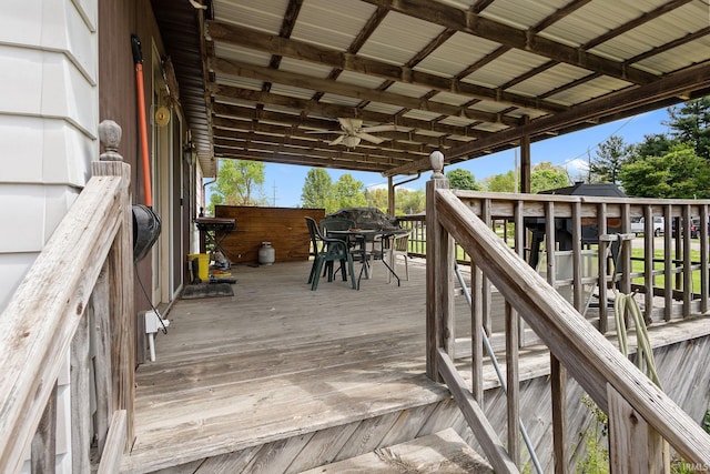 wooden deck with outdoor dining space