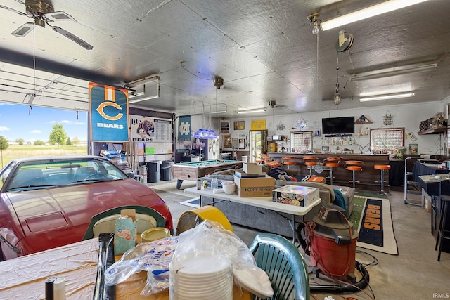 garage with a ceiling fan
