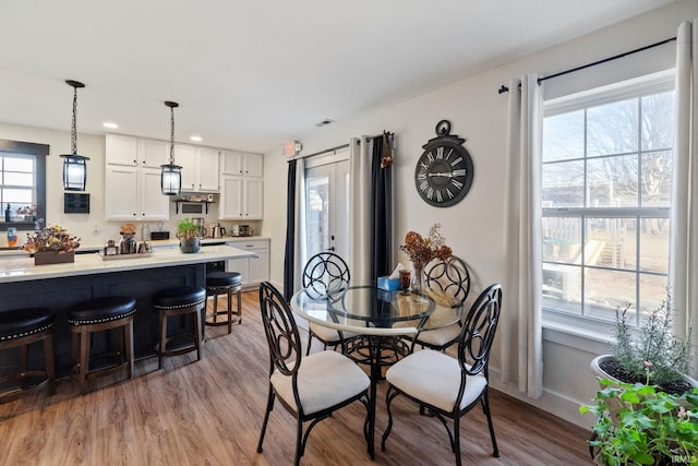 1308 Tedlee Dr, Kokomo, IN 46901 - dining area featuring light wood-style flooring, plenty of natural light, and recessed lighting