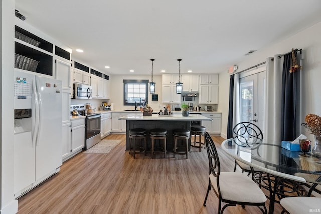 1308 Tedlee Dr, Kokomo, IN 46901 - dining space with light wood-style flooring and recessed lighting