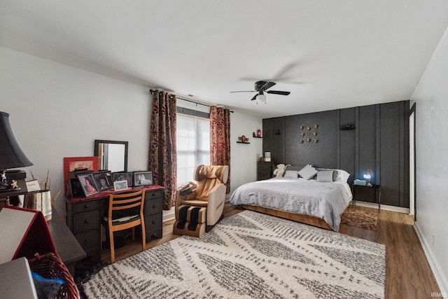 1308 Tedlee Dr, Kokomo, IN 46901 - bedroom featuring wood finished floors, a ceiling fan, and baseboards