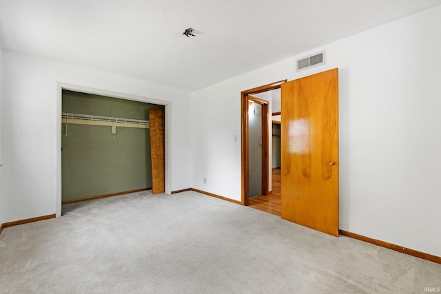3430 Woodrow Ave, Fort Wayne, IN 46805 - unfurnished bedroom with carpet, baseboards, and a closet