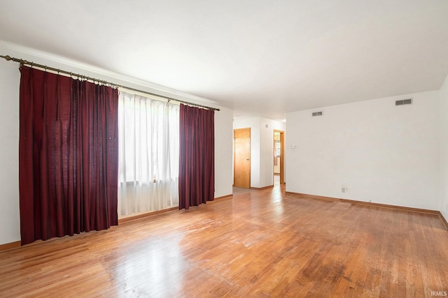56226 Tanglewood Ln, Osceola, IN 46561 - spare room with light wood finished floors and baseboards