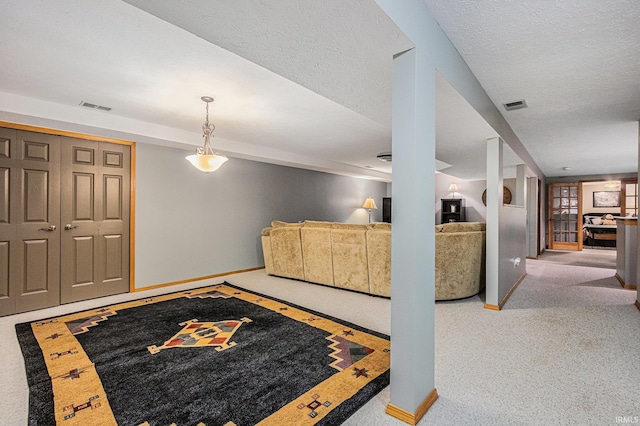 entryway featuring baseboards and carpet