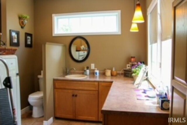 127 W Mill St, Bremen, IN 46506 - bathroom featuring toilet and vanity