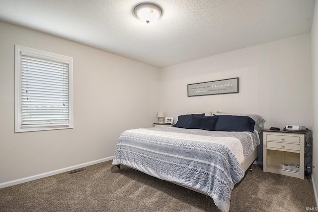 bedroom with carpet floors and baseboards