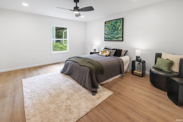 bedroom featuring light wood-style flooring, baseboards, recessed lighting, and ceiling fan