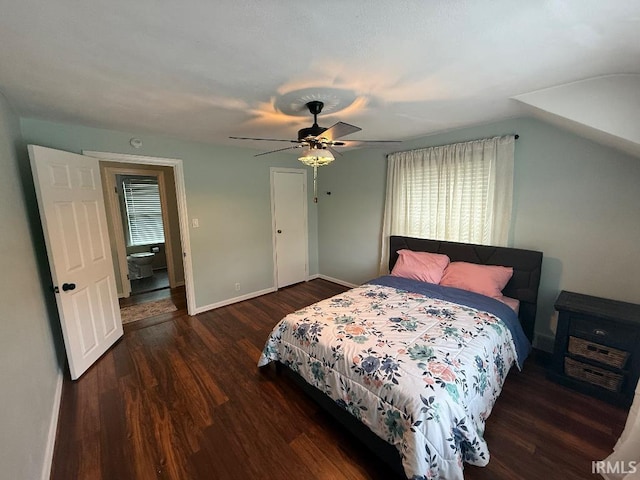 bedroom with wood finished floors, ceiling fan, baseboards, and a closet