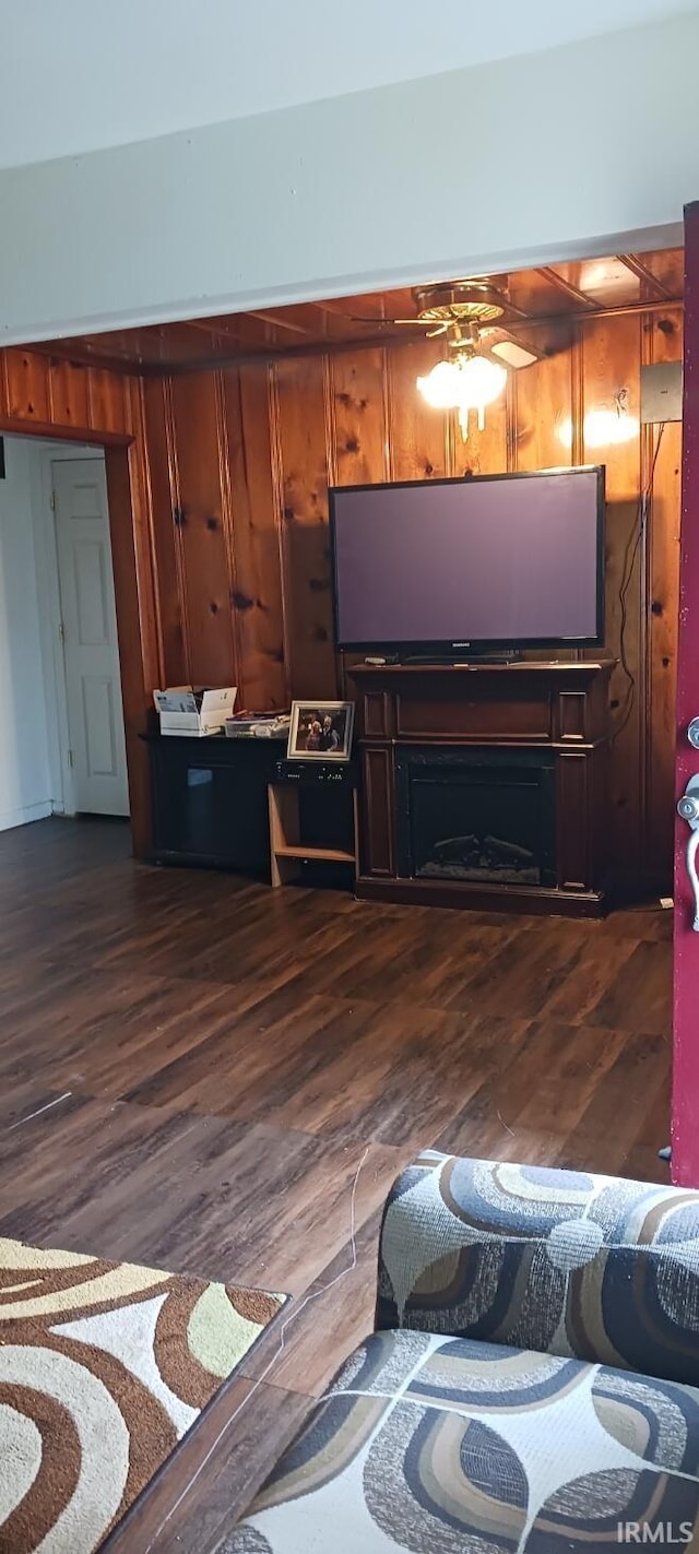 645 Dekemper Ln, Mount Vernon, IN 47620 - living room featuring dark wood-style floors and a fireplace