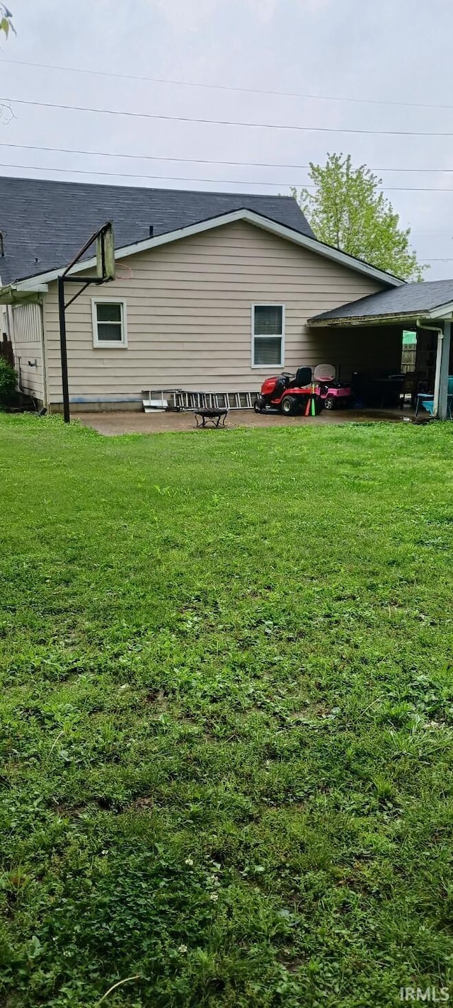 645 Dekemper Ln, Mount Vernon, IN 47620 - back of house with a yard