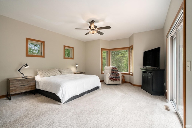 51205 County Road 25th Rd, Bristol, IN 46507 - bedroom featuring light colored carpet, baseboards, and a ceiling fan