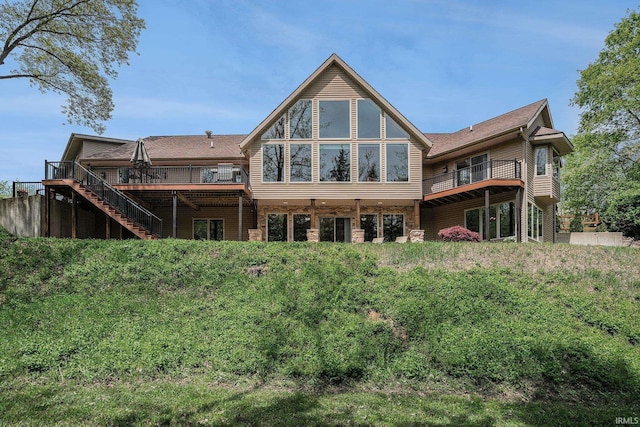 51205 County Road 25th Rd, Bristol, IN 46507 - rear view of house with stairs and a wooden deck