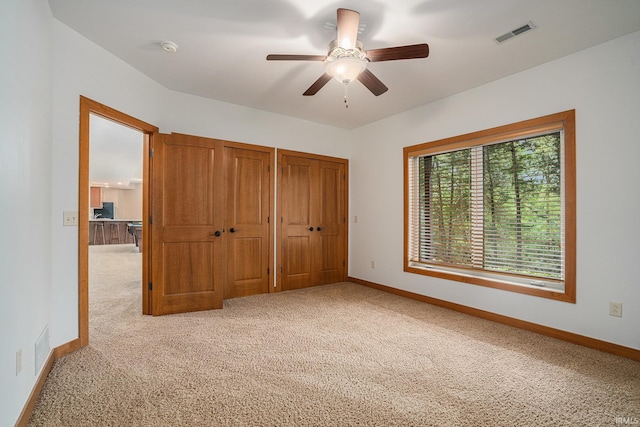 51205 County Road 25th Rd, Bristol, IN 46507 - unfurnished bedroom featuring carpet, baseboards, and ceiling fan