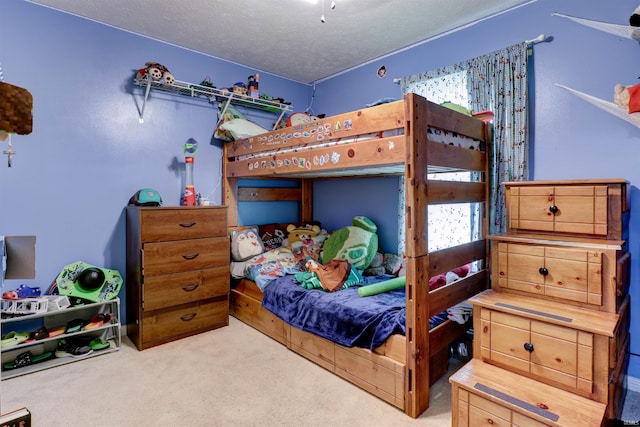 4732 Rathbone Dr, Evansville, IN 47725 - carpeted bedroom with a textured ceiling