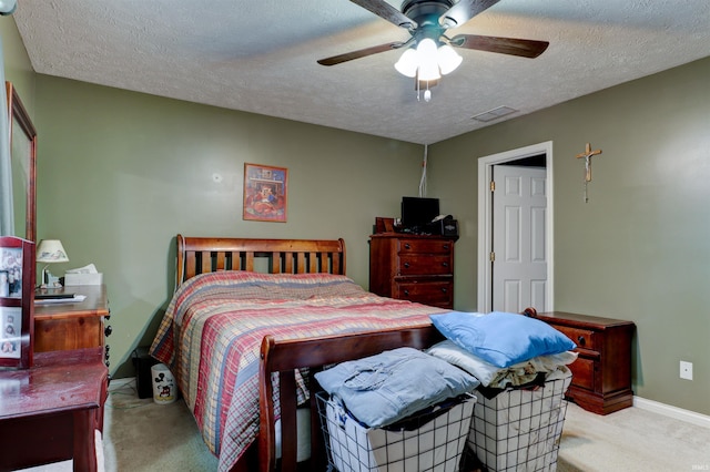 4732 Rathbone Dr, Evansville, IN 47725 - bedroom featuring carpet floors, a textured ceiling, baseboards, and ceiling fan