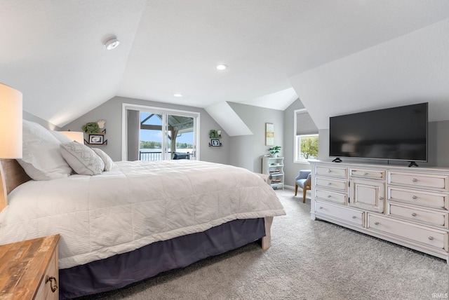 bedroom featuring access to exterior, lofted ceiling, light carpet, and recessed lighting